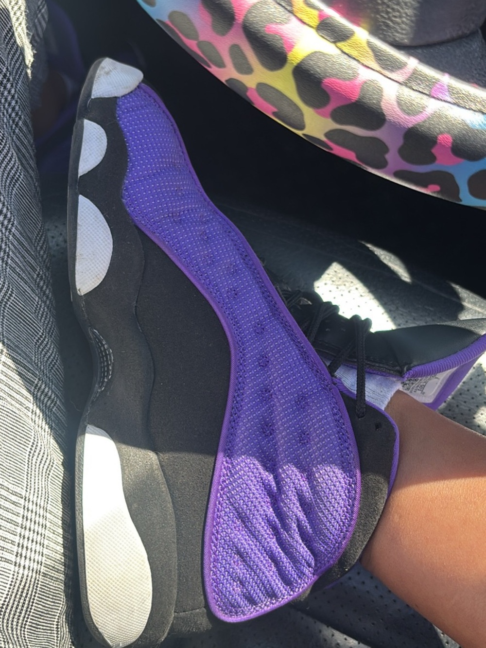 Jordan Women’s Black and Purple Retro Sneakers